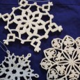 Third Ornament of Christmas Just like real snowflakes, no two of my grandpa's scroll-sawed creations are alike.