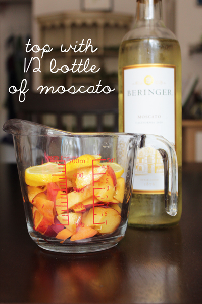 Top the fruit in the 2-cup sized Pyrex cup with half a bottle of moscato.