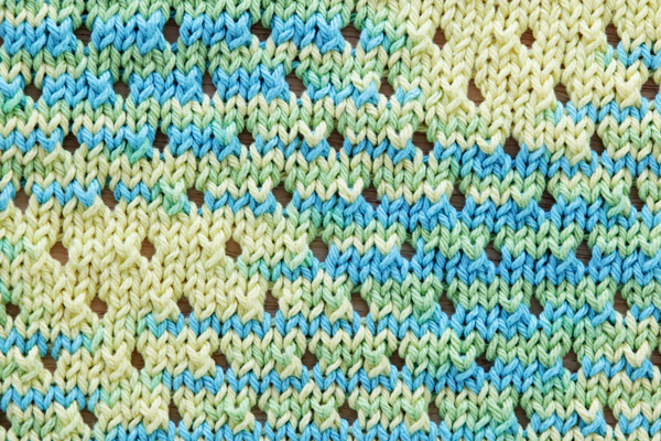 Staggered Holes Baby Blanket Knitting Pattern at Hands Occupied