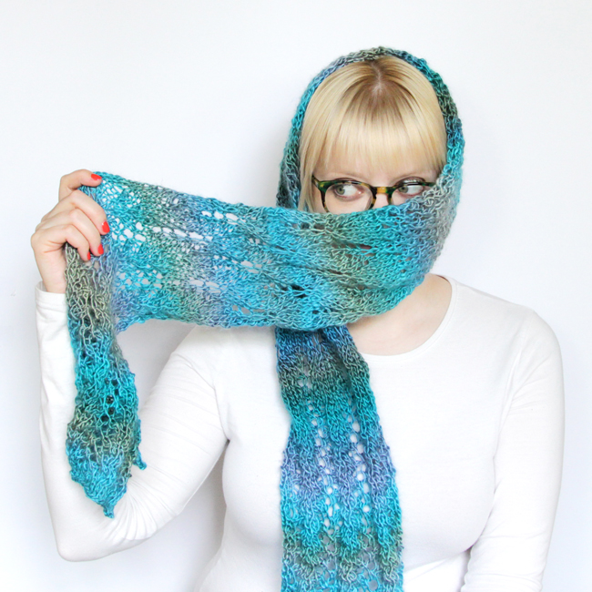 Heidi Gustad modeling her Spring Meadow Scarf knitting design. 