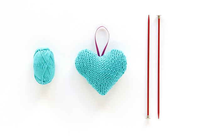 Knit Heart Ornament - Click through for a free knitting pattern for this cute star ornament, which also makes a great tree star, gift topper or baby toy!