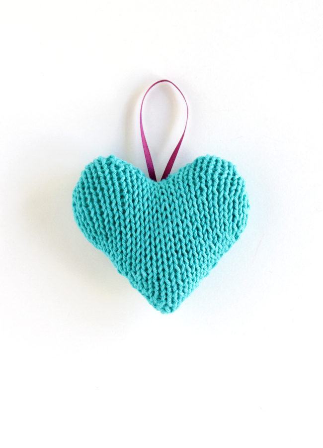 Knit Heart Ornament - Click through for a free knitting pattern for this cute star ornament, which also makes a great tree star, gift topper or baby toy!
