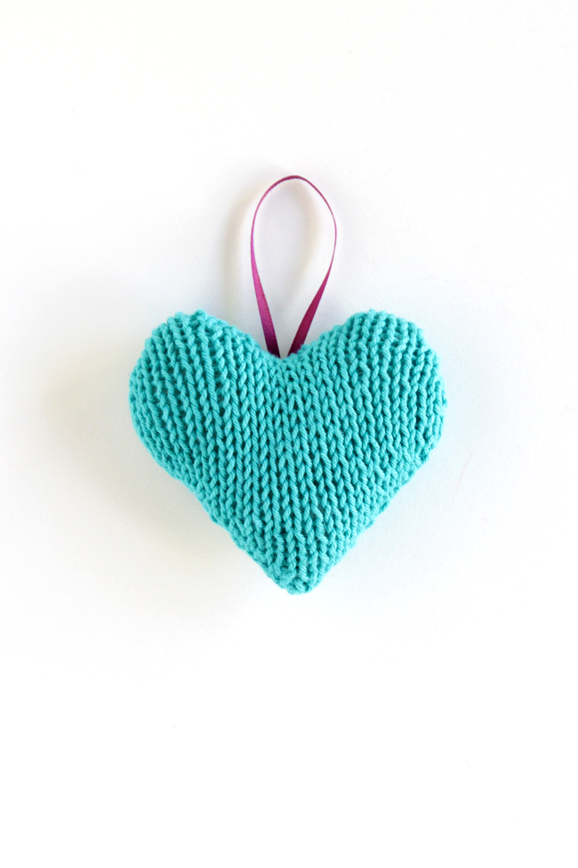 Knit Heart Ornament - Click through for a free knitting pattern for this cute star ornament, which also makes a great tree star, gift topper or baby toy!