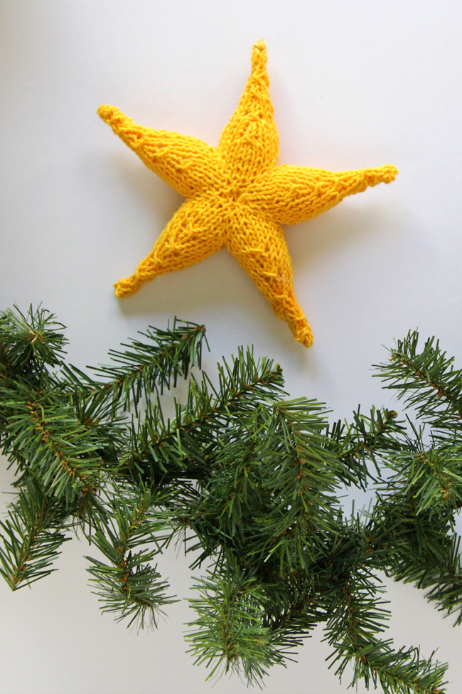 Knit Star Ornament - Click through for a free knitting pattern for this cute star ornament, which also makes a great tree star, gift topper or baby toy!