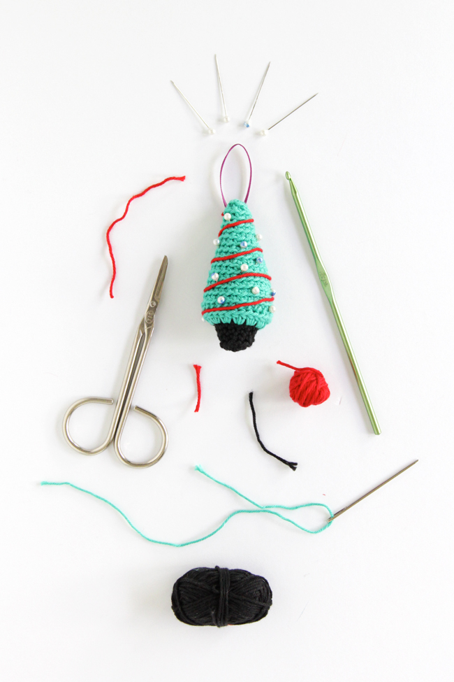 A pattern for a crochet Christmas tree ornament that works up super quick! Click through for the free pattern.
