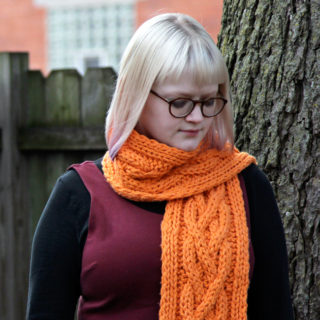 Click through to get a free pattern for the Quad Cable Scarf by Heidi Gustad