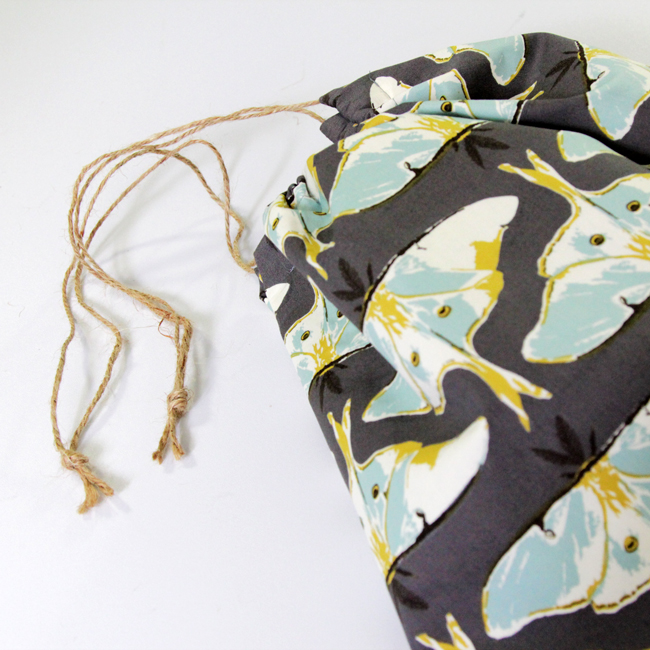 Learn how to sew a super simple drawstring bag in minutes!