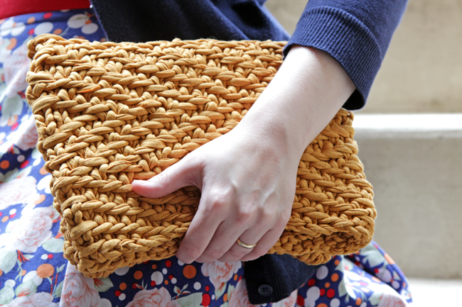 Get your hands on the free pattern to knit this versatile foldover clutch out of fabric yarn!