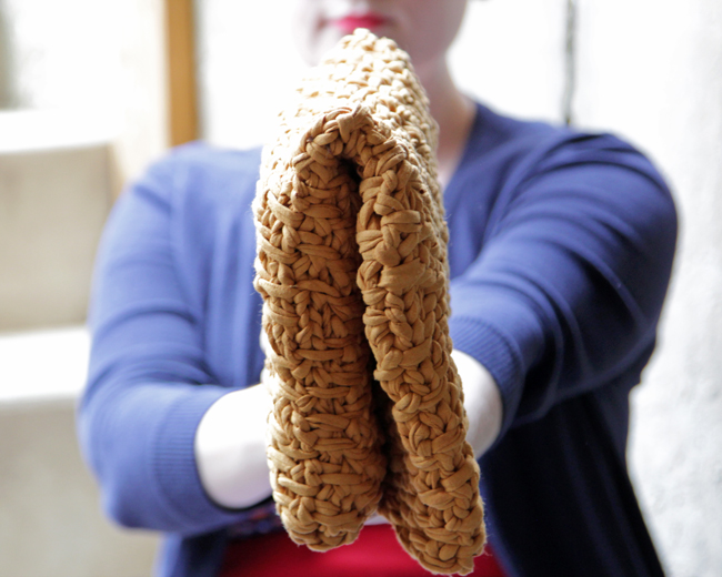 Get your hands on the free pattern to knit this versatile foldover clutch out of fabric yarn! 