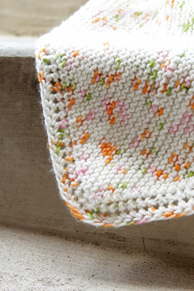 Check out the oh-so-sweet Peas & Carrots Baby Blanket! Get the free knitting pattern for this cute, beginner-friendly baby blanket. A total hit at baby showers!