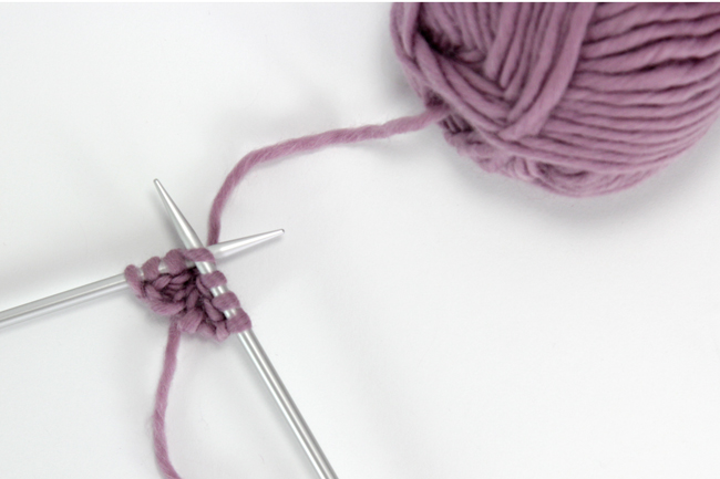 Learn how to work an easy garter stitch tab with this knitting video tutorial. This easy-to-master knitting technique is a staple among shawl knitters. You'll commonly find garter tabs used to cast on shawl patterns.