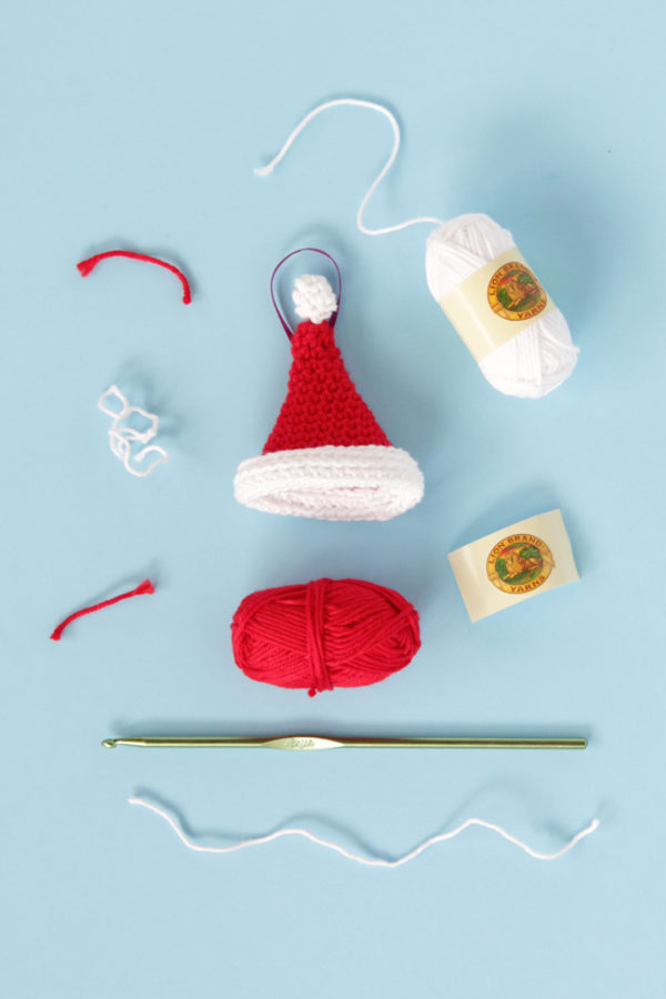 Crochet a jaunty Santa hat ornament with this free amigurumi pattern.