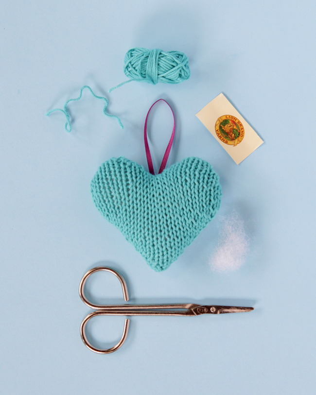 Add a little love to your Christmas tree with a free pattern for this knit heart ornament.