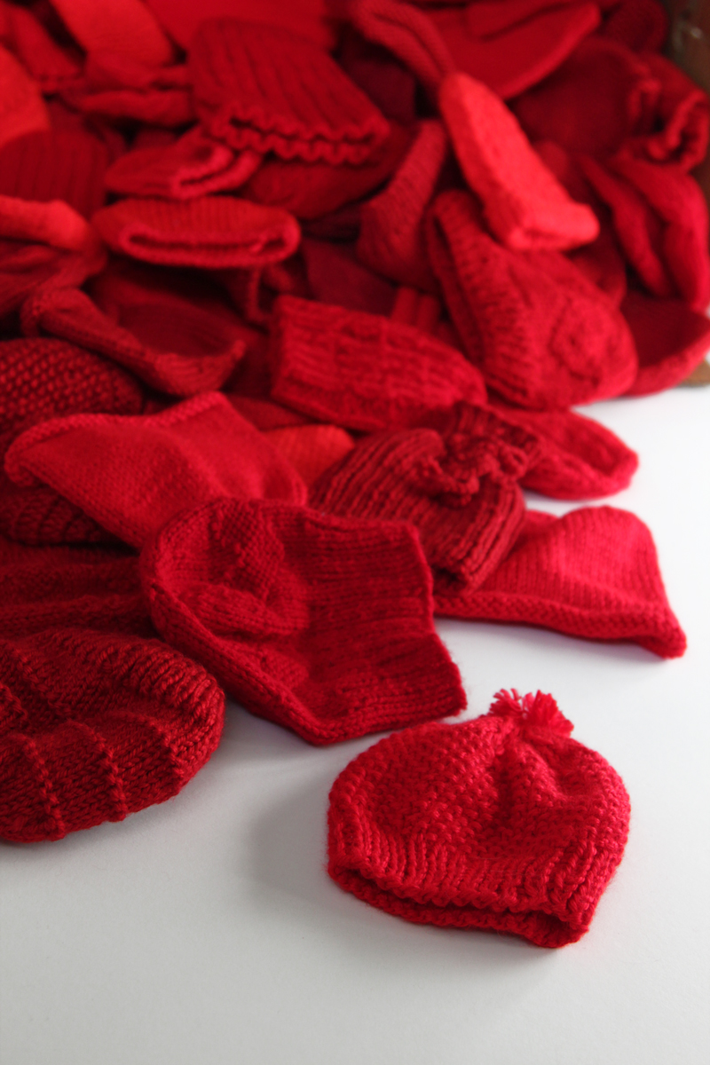 Little Hats Big Hearts pairs newborns with red hats and life saving information every year during American Heart Month. Click through for free patterns and donation information. 