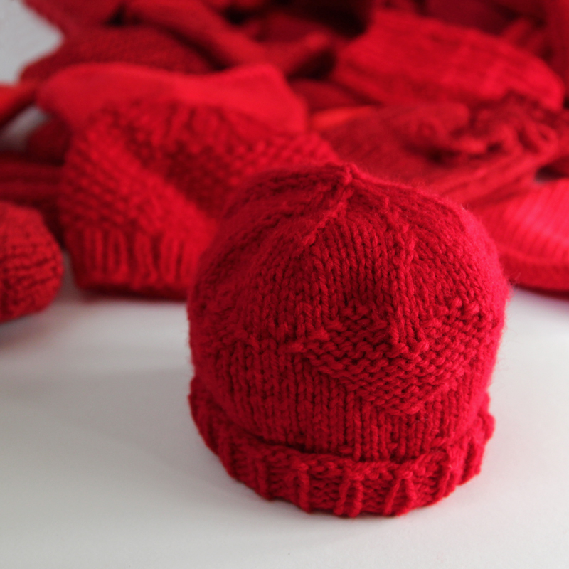 Little Hats Big Hearts pairs newborns with red hats and life saving information every year during American Heart Month. Click through for free patterns and donation information. 