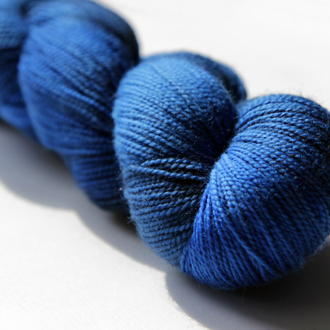 ColorPurl High Street Yarn in the Deep Space colorway - a rich combination of royal blue and navy hues.