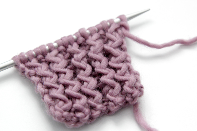Finding a new knit stitch to add something interesting to your projects is always a lot of fun. Learn how to knit the rick rack rib stitch in the round or flat with an easy video tutorial from Hands Occupied.
