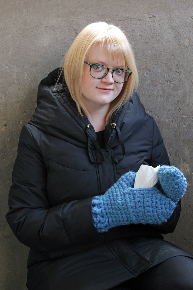 With these mittens, you can keep your hands cozy while keeping Kleenex tissues close at hand! Simply make one traditional mitten, then crochet its mate with an opening to fit a Kleenex Go Pack on top of your hand. These chunky mittens can fit either hand, depending on where its most convenient for you to keep your tissues during sniff season.