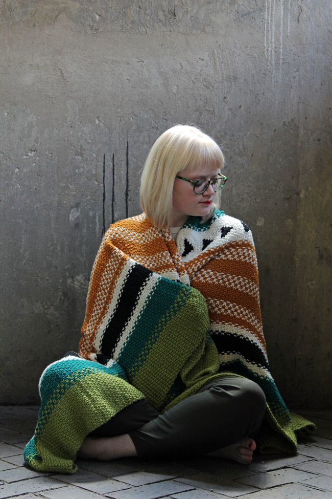 The Arizona Afghan is a single panel blanket inspired by iconic woven blankets of the American Southwest. The bold, graphic design of this throw is accomplished through a combination of linen stitch, stranded colorwork, slipped stitches and a dash of intarsia. Get the pattern in I Like Knitting magazine. 
