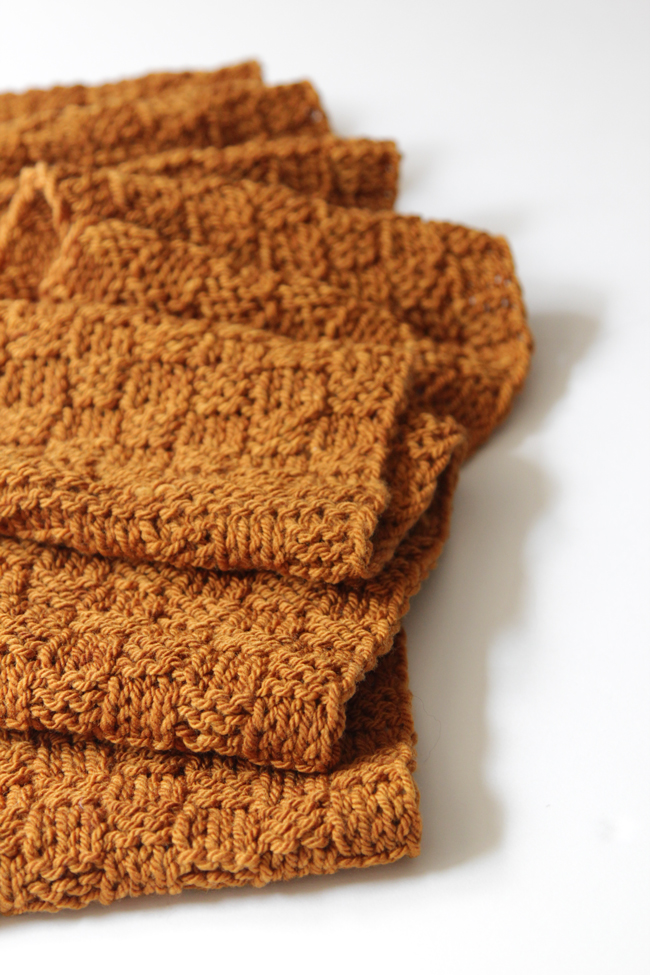 Get your hands on a free knitting pattern for the Golden Check Infinity Scarf!