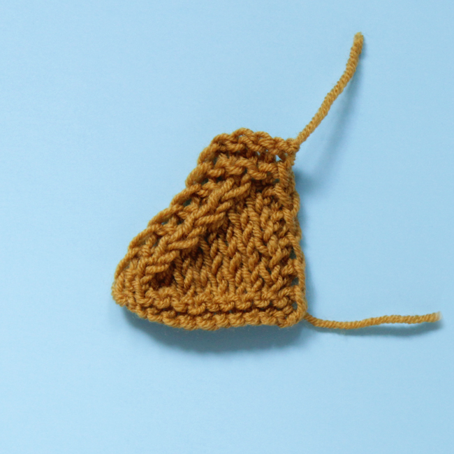 Learn how to knit a k3tog decrease with an easy-to-follow video tutorial. Using a knit 3 together, you're working a double decrease, reducing your stitch count by two. 