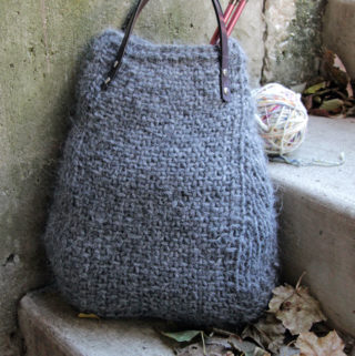 The Lopi Tote makes use of bulky yarn and elegant, screw-in handles to create a deep bag with a wide base that knits up quick. Get your hands on this free pattern, designed with knitters in mind. The Lopi Tote is perfect for carrying your next knitting project on the go!