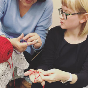 Knit & Crochet Designer Heidi Gustad teaching a knitting workshop.