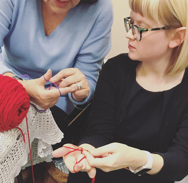 Knit & Crochet Designer Heidi Gustad teaching a knitting workshop.