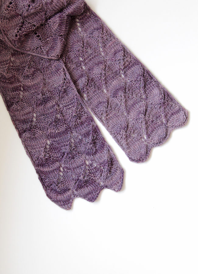 Get your hands on the Ruby Stole knitting pattern by Heidi Gustad. Featuring short rows, easy lace and tons of gorgeous texture, the Ruby Stole is a fun, fast single skein knitting pattern. Find it on Ravelry or in the Hands Occupied Pattern Shop.