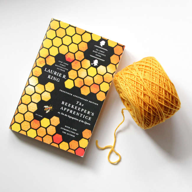 The Beekeeper's Apprentice by Laurie R. King and a skein of Why Knot Fibers' Spunky yarn in Magic for Marigold