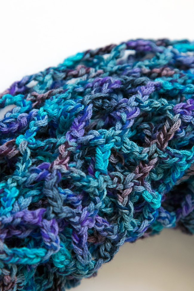 Crochet the versatile Market Cowl, a free pattern that does double duty as a layering-friendly cowl or wrap.