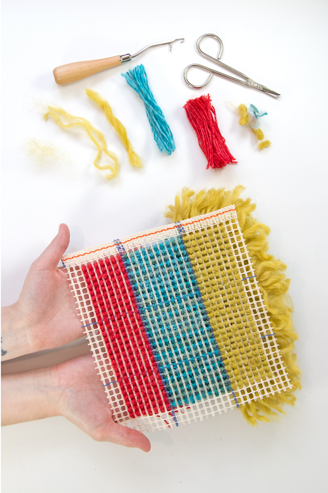 Learn how to latch hook with an easy-to-follow tutorial. Make wall hangings, throw pillows, rugs, and more! Latch hook projects are a great use for scrap yarn too.