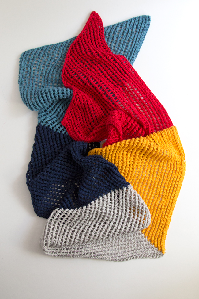 Who doesn't love an easy-to-knit, versatile pattern? The Wherever Wrap is a fun colorblock piece knit with a simple lace motif. Get the free knitting pattern by designer Heidi Gustad. 