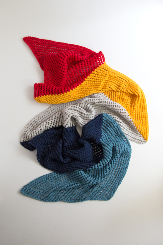 Who doesn't love an easy-to-knit, versatile pattern? The Wherever Wrap is a fun colorblock piece knit with a simple lace motif. Get the free knitting pattern by designer Heidi Gustad. 