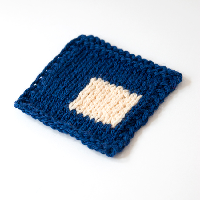 Intarsia 101: What is intarsia knitting, how it's different from stranded colorwork, and how to knit intarsia, featuring an in-depth video tutorial to demonstrate the technique for absolute beginners. Click through for this awesome tutorial.