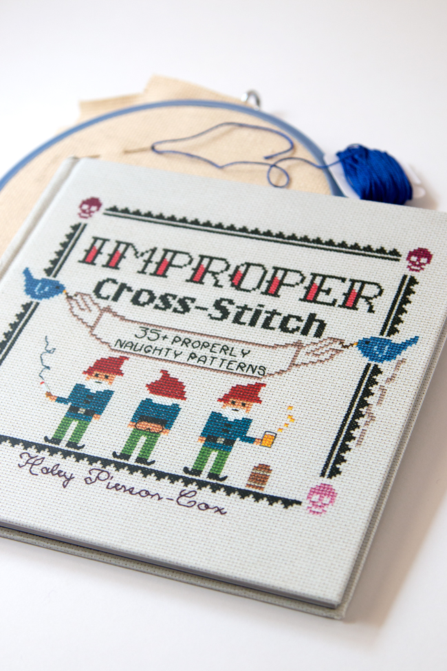 Improper Cross-Stitch by Haley Pierson-Cox is an irreverent, fun & contemporary take on an all-time classic craft. Filled with 35+ fun patterns and an accessible guide to cross-stitch, this book will have you stitching and grinning all day long!