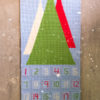 Scandinavian Advent Calendar - free crochet pattern -- An advent calendar is a great way to make your own keepsake Christmas decoration and build a family tradition for years to come. The Scandinavian Advent Calendar is great for crocheters at almost any skill level and is inspired by beautiful holiday decor found in Scandinavia. This pattern features basic embroidery stitches for added texture and a handmade look.