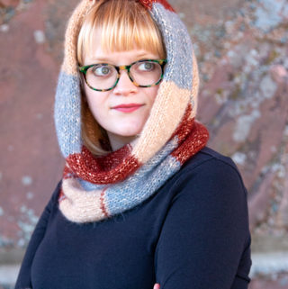 Knit yourself a quick cowl that doubles as a hood - a snood! The Checked Snood is a colorful, geometric knitting pattern that uses 3 colors of Berroco Brielle to create a stunning, versatile accessory you'll wear from fall to spring. Bonus: it's a free pattern!