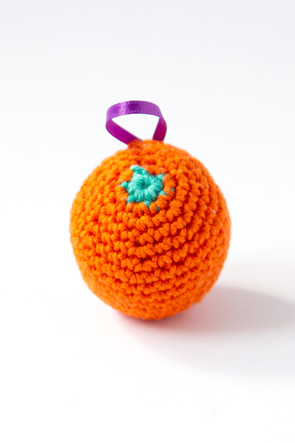The gift of citrus fruit, particularly oranges, is a long-standing Christmas treat. To celebrate this old-fashioned holiday tradition, crochet a fast orange ornament for your tree! Get the free pattern on Hands Occupied.