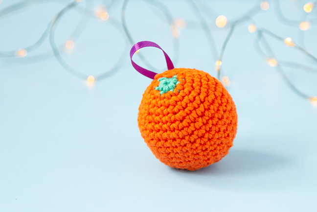 The gift of citrus fruit, particularly oranges, is a long-standing Christmas treat. To celebrate this old-fashioned holiday tradition, crochet a fast orange ornament for your tree! Get the free pattern on Hands Occupied.