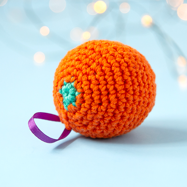 The gift of citrus fruit, particularly oranges, is a long-standing Christmas treat. To celebrate this old-fashioned holiday tradition, crochet a fast orange ornament for your tree! Get the free pattern on Hands Occupied.