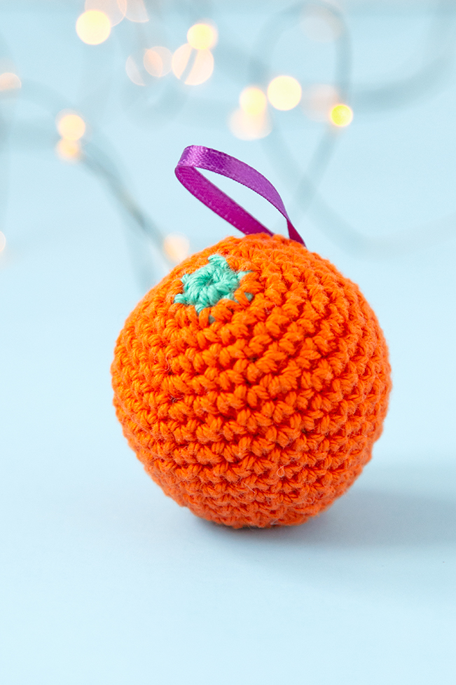 The gift of citrus fruit, particularly oranges, is a long-standing Christmas treat. To celebrate this old-fashioned holiday tradition, crochet a fast orange ornament for your tree! Get the free pattern on Hands Occupied.