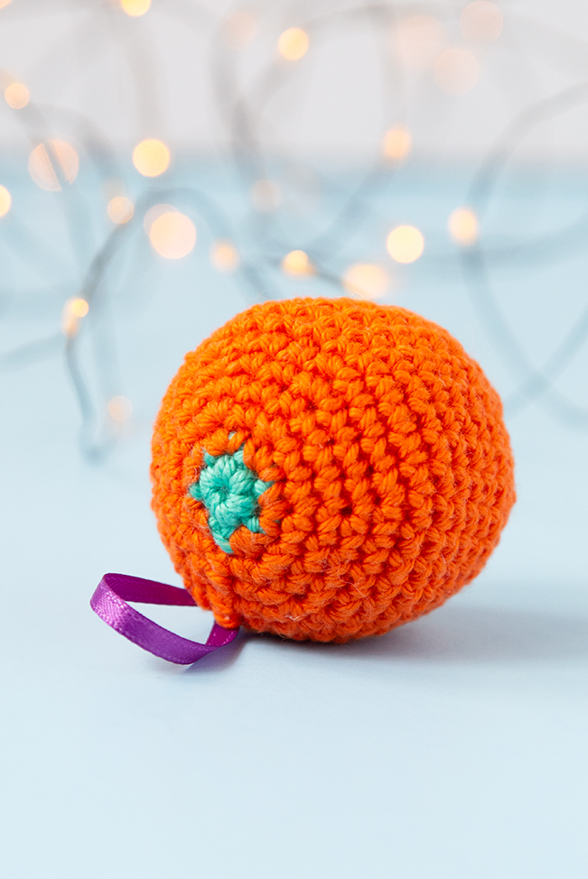 The gift of citrus fruit, particularly oranges, is a long-standing Christmas treat. To celebrate this old-fashioned holiday tradition, crochet a fast orange ornament for your tree! Get the free pattern on Hands Occupied.