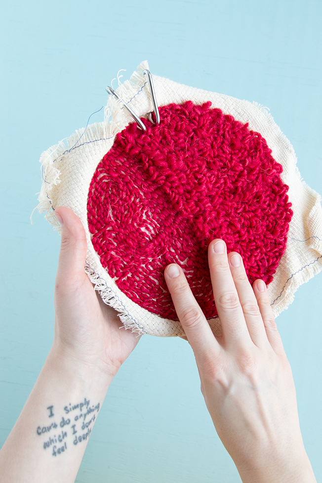 Weaving in your ends on a punch needle project is easy! Check out this step-by-step tutorial for tips and tricks for hiding and securing your punch needle rug hooking tails.