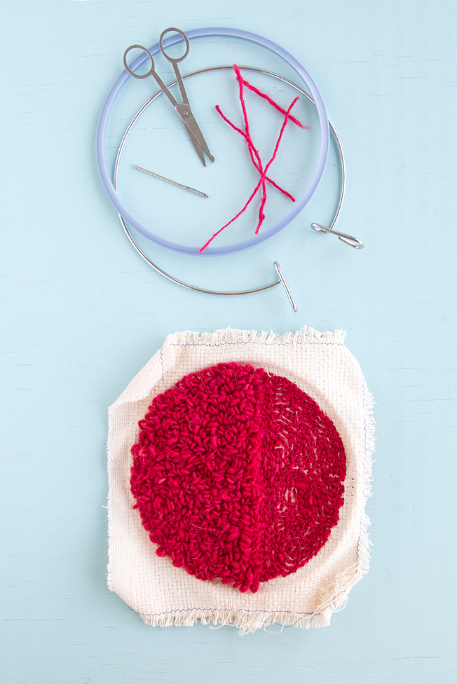 Weaving in your ends on a punch needle project is easy! Check out this step-by-step tutorial for tips and tricks for hiding and securing your punch needle rug hooking tails.
