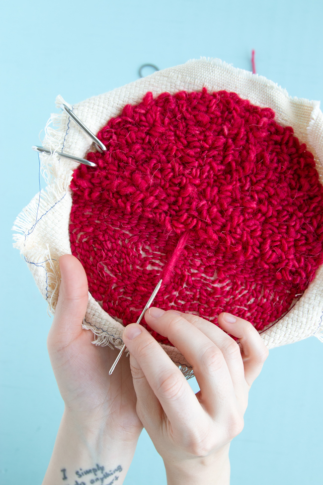 Weaving in your ends on a punch needle project is easy! Check out this step-by-step tutorial for tips and tricks for hiding and securing your punch needle rug hooking tails.