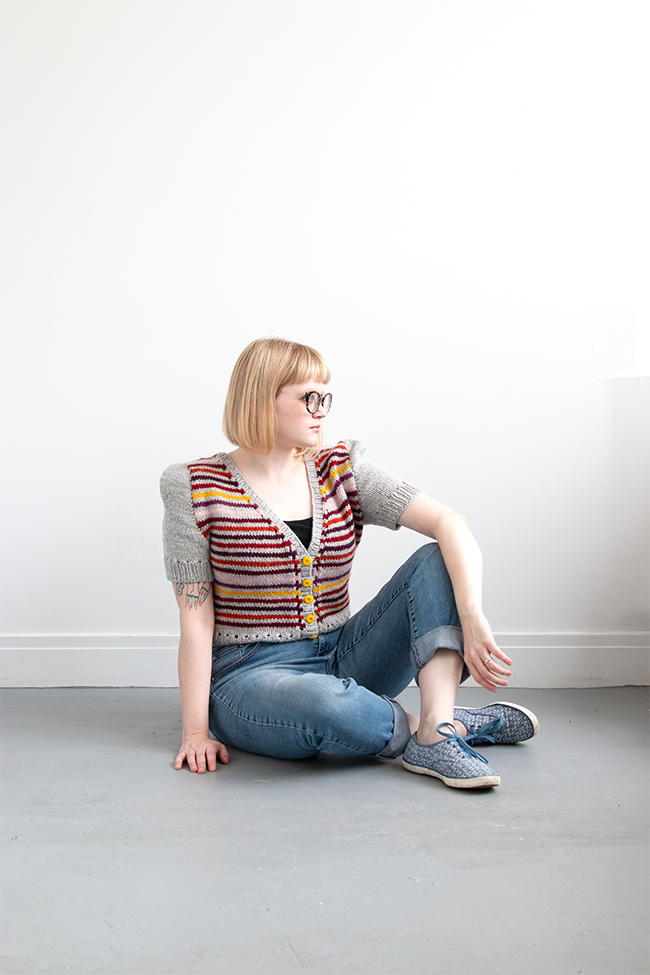 Knittable in two weekends (really!), a short sleeved, worsted weight cardigan is a quick addition to a handmade wardrobe. Check out Heidi's modified take on the Myrna cardigan using Blue Sky Fibers' Woolstok yarn.