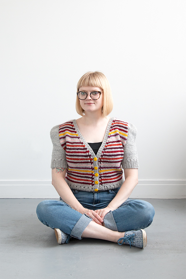Knittable in two weekends (really!), a short sleeved, worsted weight cardigan is a quick addition to a handmade wardrobe. Check out Heidi's modified take on the Myrna cardigan using Blue Sky Fibers' Woolstok yarn.