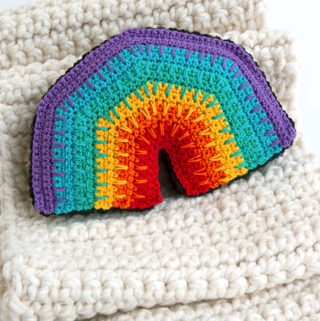 Over the Rainbow Softie, a free crochet pattern using 1 package of Lion Brand Bon Bons yarn. Crochet an adorable, on-trend softie toy that easily doubles as DIY nursery decor.