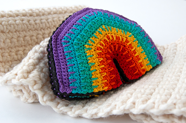 Over the Rainbow Softie, a free crochet pattern using 1 package of Lion Brand Bon Bons yarn. Crochet an adorable, on-trend softie toy that easily doubles as DIY nursery decor.